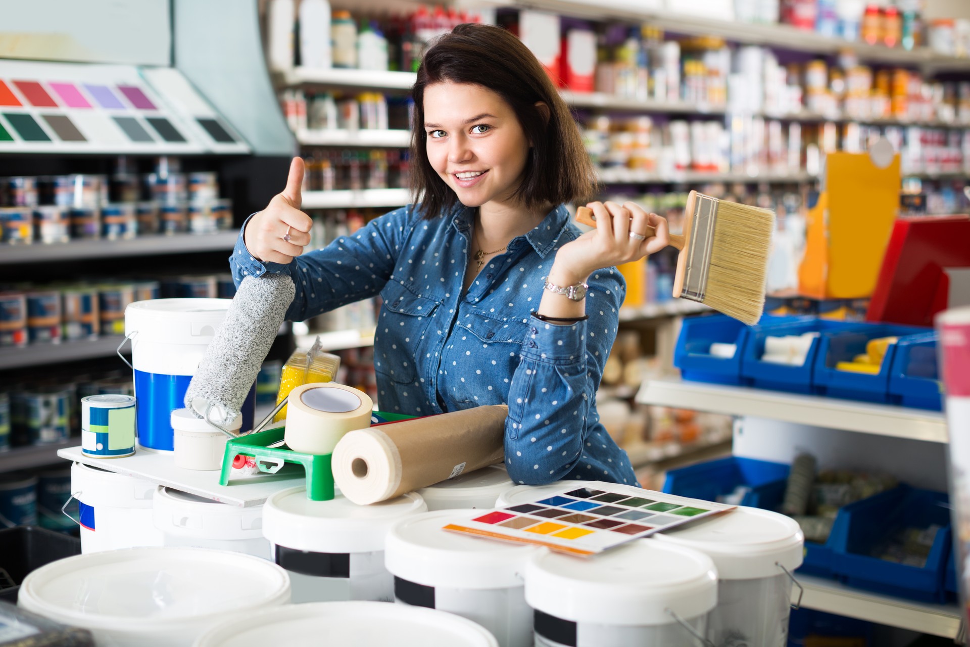 Girl 18-25 years old is purchasing tools for house improvements